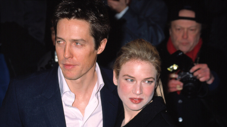 Hugh Grant and Renee Zellweger with paparazzi