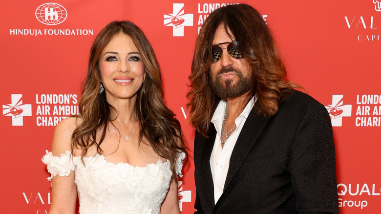 Elizabeth Hurley and Billy Ray Cyrus smiling together