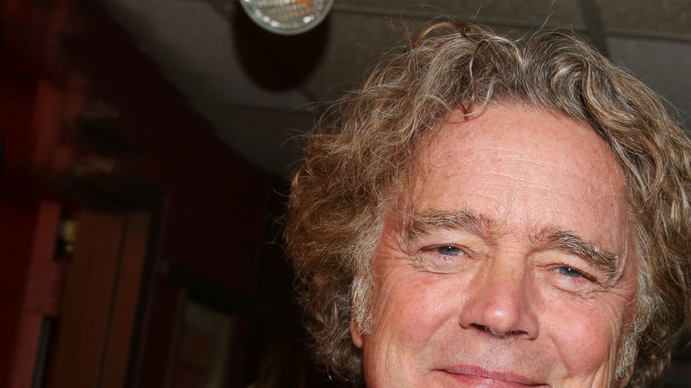 John Schneider smiling