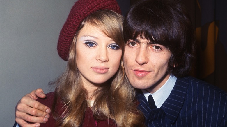 Pattie Boyd and George Harrison pose together for a photo