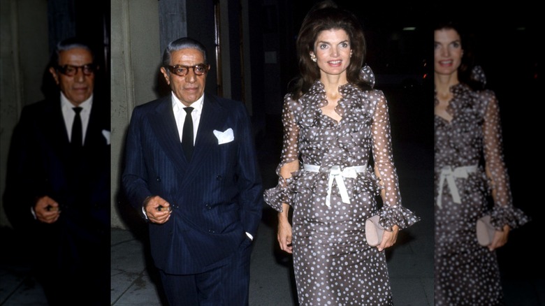 Aristotle Onassis and Jacqueline Kennedy are photographed attending an event