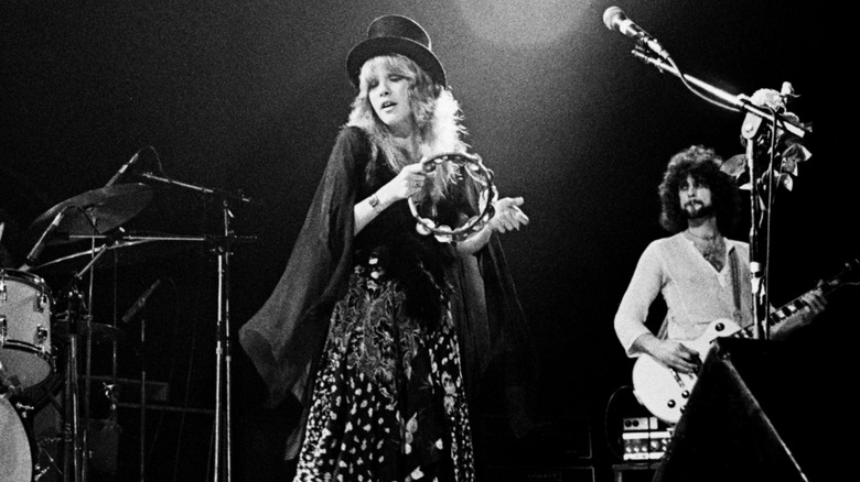 Stevie Nicks and Lindsey Buckingham perform on stage in 1975