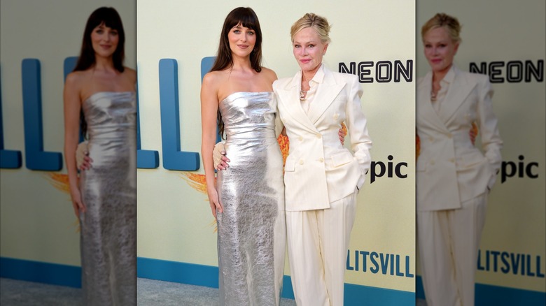 Dakota Johnson and Melanie Griffith attend the premiere of "Splitsville"