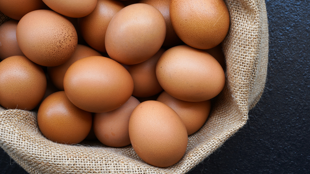 Brown eggs in a basket