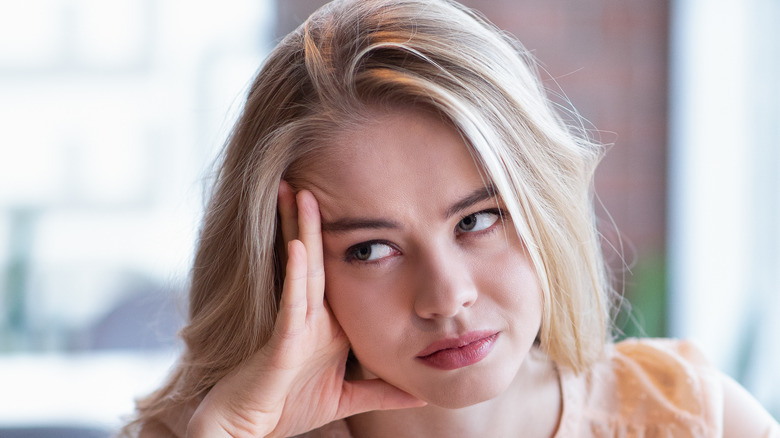 Woman looking annoyed during date