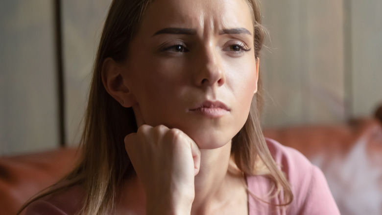 Woman looking confused on a date