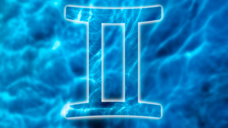 Gemini sign blue background