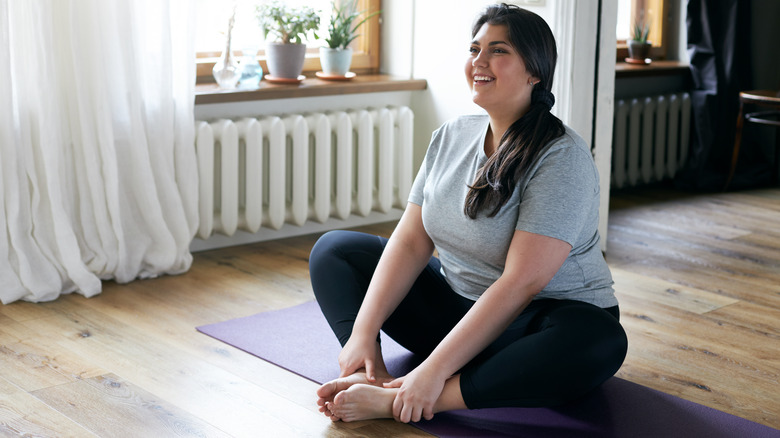 Woman working out from home