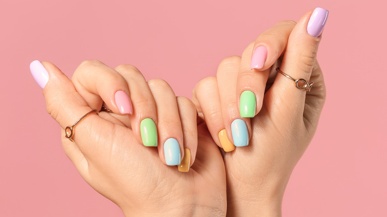 Hand with colorful nails