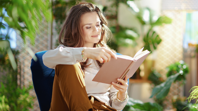 Woman engrossed in a book