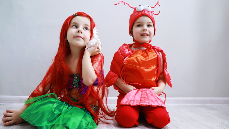 Kids dressed as mermaid, crab