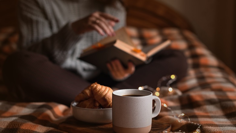 woman reading in bed at night