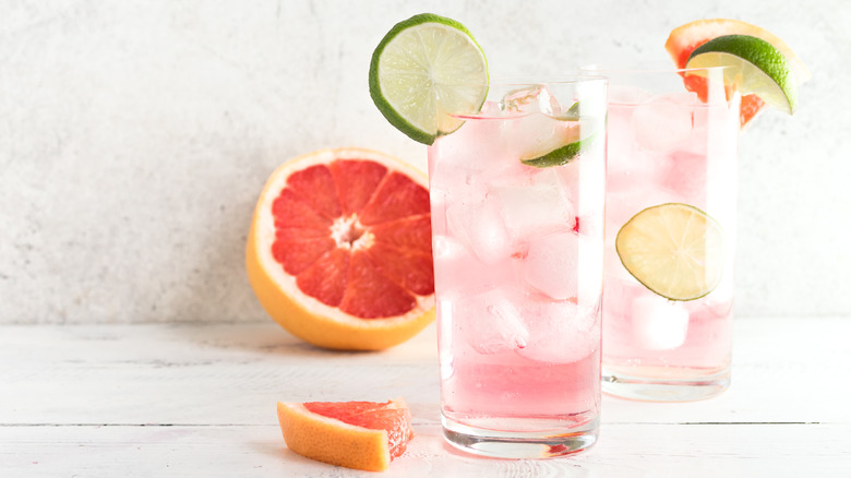 Two grapefruit palomas with lime