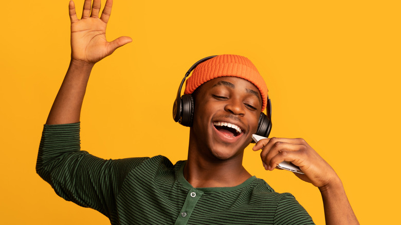 Man smiling with headphones