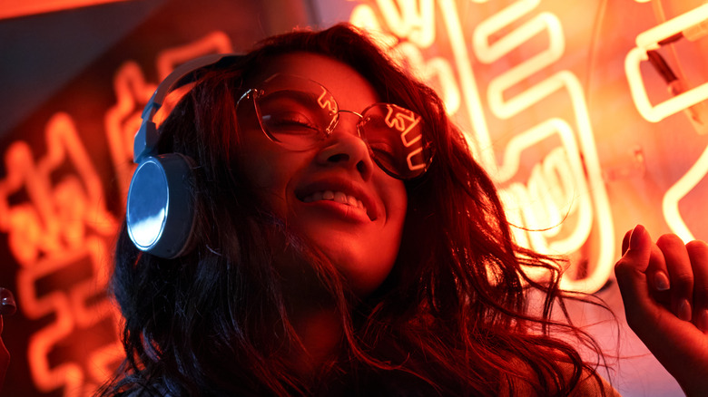 Woman eyes closed with headphones