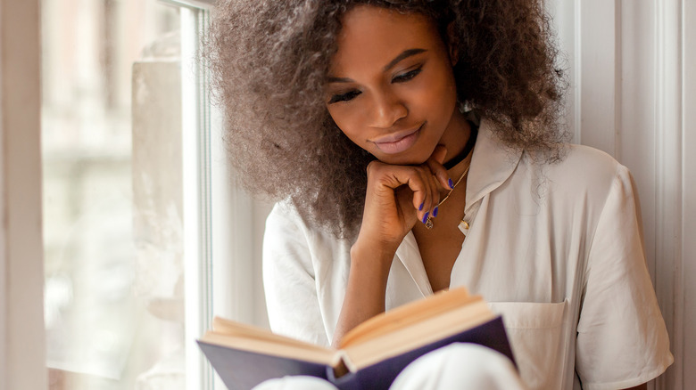 Woman reading book