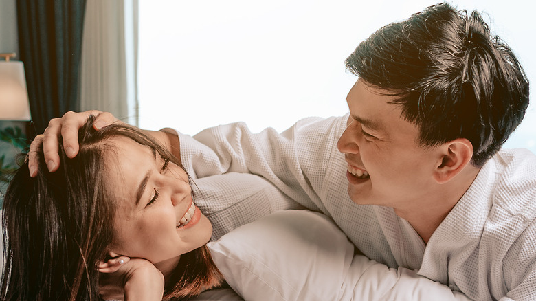 Man and woman laughing