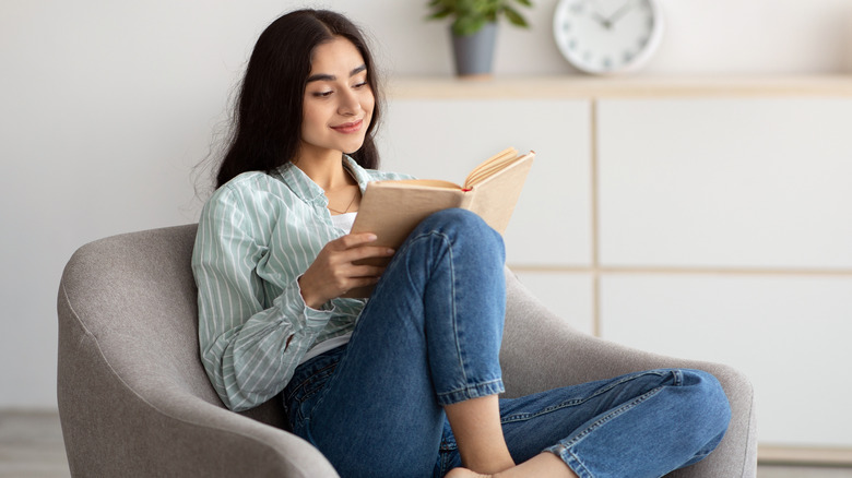 Young woman reading a book