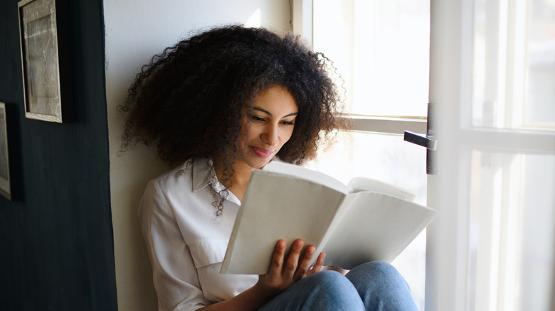 A woman reading a book