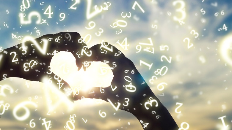 Two hands making a heart 