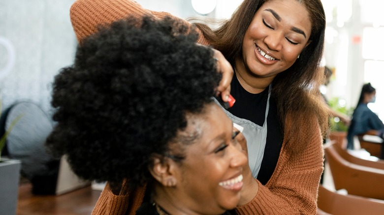 woman getting her hair done