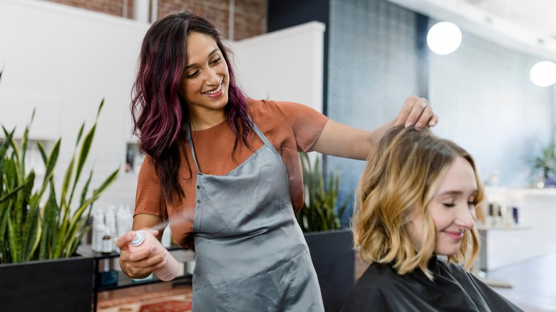 Woman getting her hair done