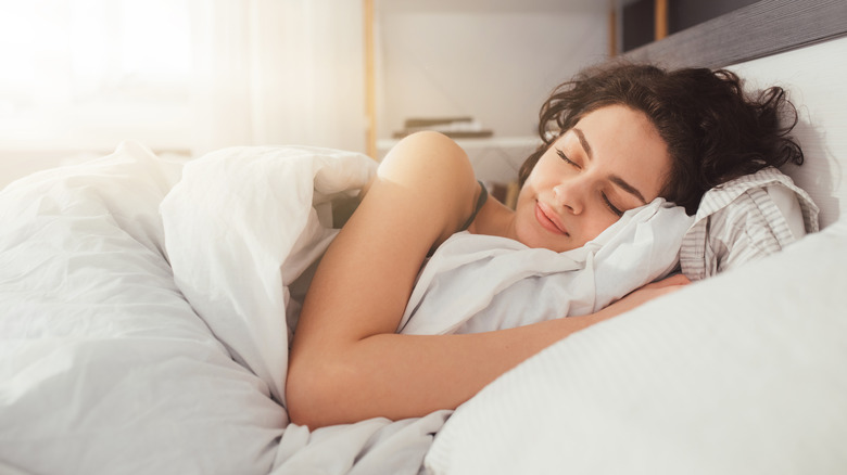 woman sleeping in bed