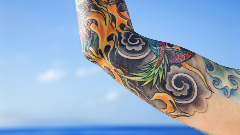 Woman with a tattooed arm in Maui