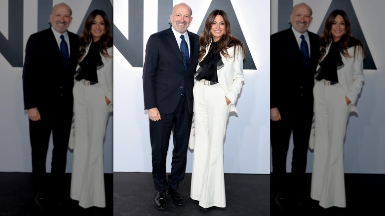 Alison Lutnick and husband Howard Lutnick pose for a photo at the Melania movie premiere