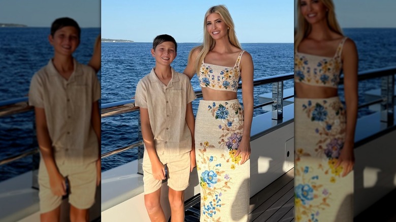 Ivanka Trump poses for a picture with her son in a sunny beachside location