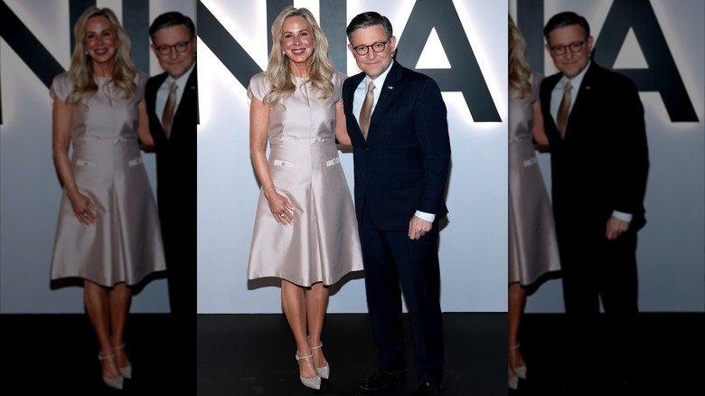 Kelly Johnson and husband House Speaker Mike Johnson pose on the red carpet at the Melania movie premiere