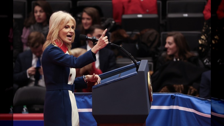 Kellyanne Conway wearing a red, white and blue coat at Donald Trump's swearing-in ceremony