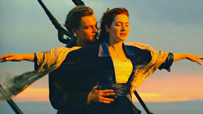 Jack (Leonardo DiCaprio) holding Rose (Kate Winslet) by the waist in 1997's 