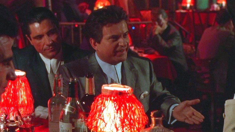 Tommy DeVito seated at a club in 1990's "Goodfellas"