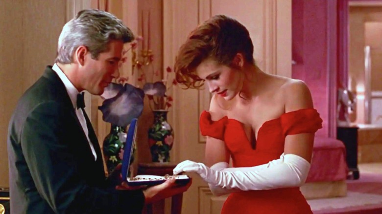 Vivian Ward touches a necklace presented by Edward Lewis in "Pretty Woman"