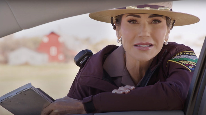 Kristi Noem dressed up as a police officer