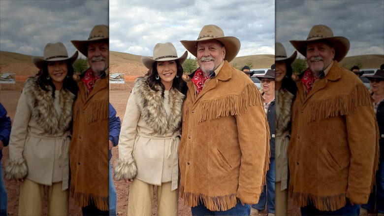 Kristi Noem wears fur and a cowboy hat