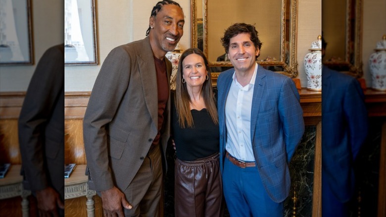 Scottie Pippin, Sarah Huckabee Sanders, and Bryan Sanders pose together for a photo (2025)