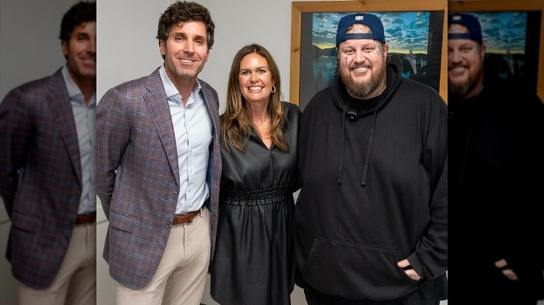 Bryan Chatfield Sanders, Sarah Huckabee Sanders, and Jelly Roll pose together during a tour of a prison in Arkansas (2024)