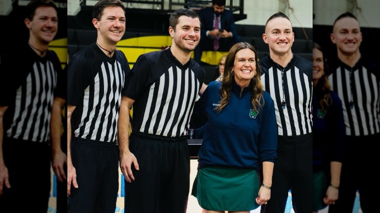 Sarah Huckabee Sanders poses with referees before a government basketball game in Arkansas (2025)