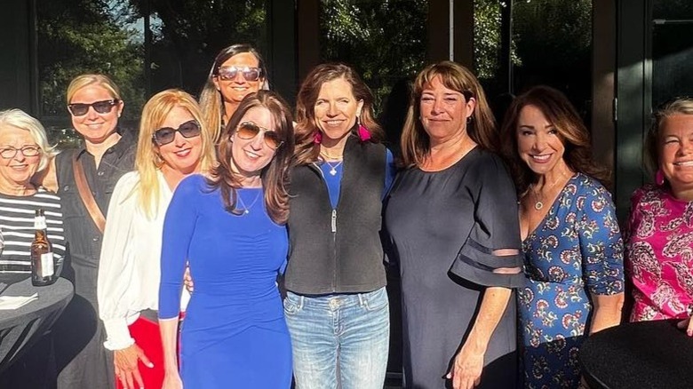 Nancy Mace poses with supporters in Ristoranti LIDI in Charleston, SC (2024)