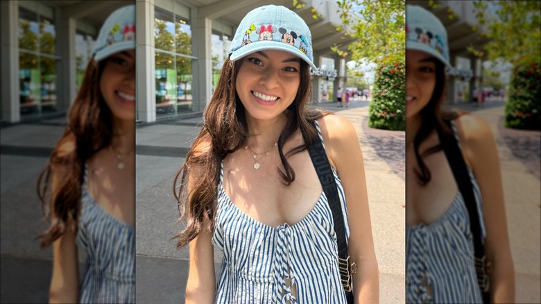 Kaelin Bradshaw smiling in a striped top and a blue cap