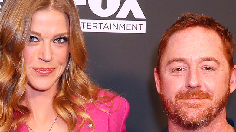 Adrianne Palicki and Scott Grimes posing