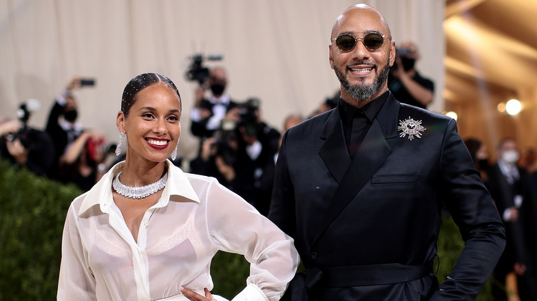 Alicia Keys and Swizz Beatz smiling