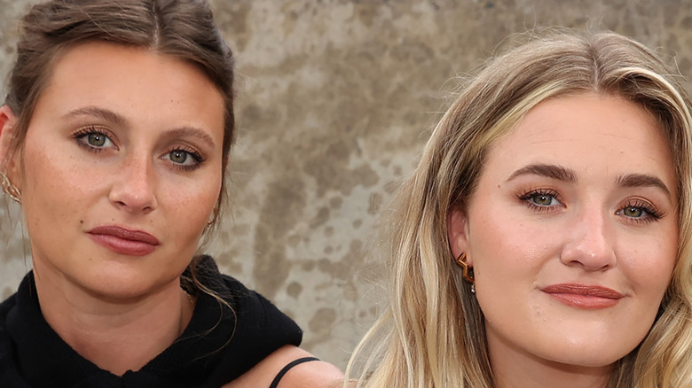 Aly and AJ posing at New York Fashion Week