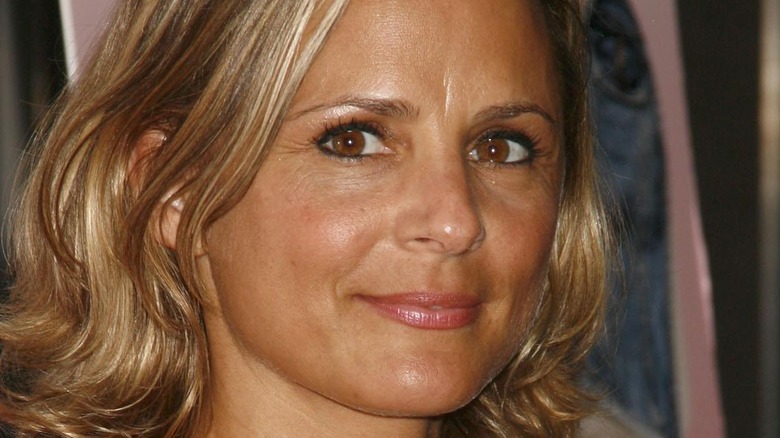 Amy Sedaris grinning