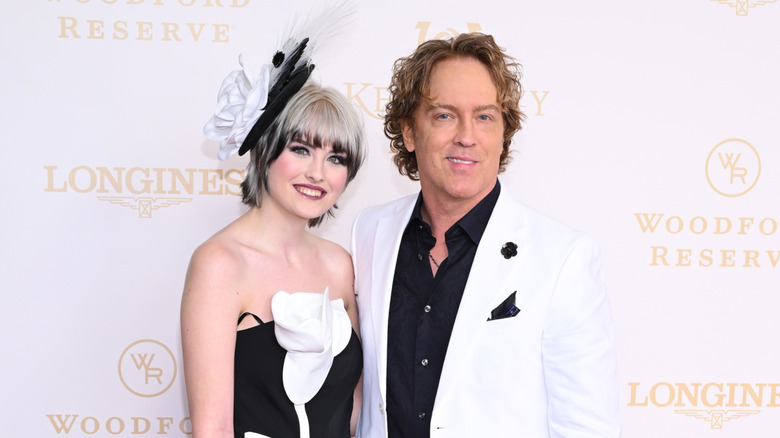 Larry and Dannielynn Birkhead posing together at the 2026 Kentucky Derby