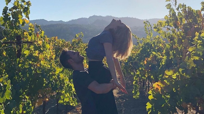 Ben Goldberg holding Kimberly Matula