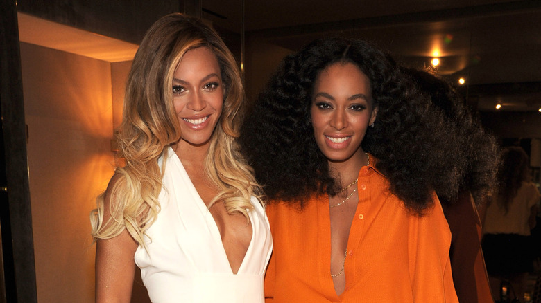 Beyoncé and Solange smiling
