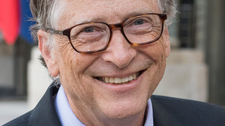 Bill Gates smiling for cameras